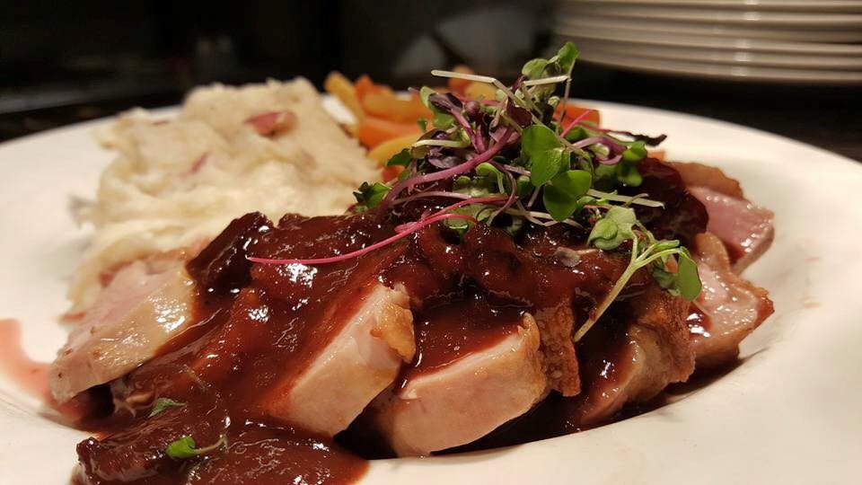 Burton's Grill - Pan-seared Duck Breast with Cherry Port Sauce.